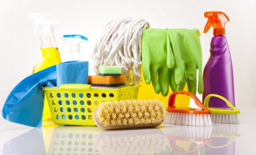 Cleaning team at Ilford Cleaners working safely with protective equipment