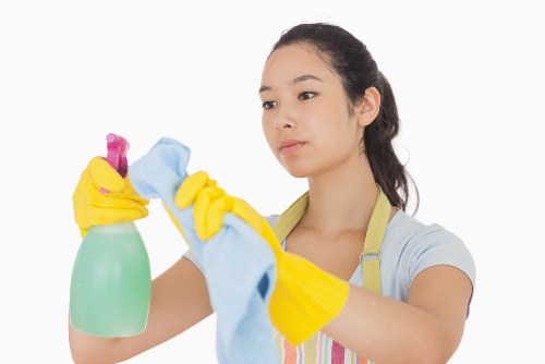 Office cleaners maintaining desks and shared spaces in Ilford
